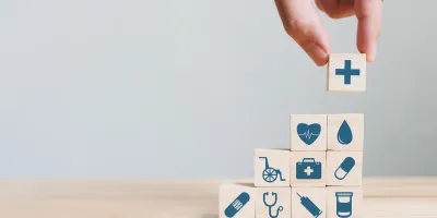 Wooden blocks with different healthcare icons