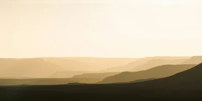 Mountains under white clouds by Matthieu Joannon on Unsplash https://unsplash.com/photos/mountains-under-white-clouds-tiw7MGZvKd8?utm_content=creditCopyText&utm_medium=referral&utm_source=unsplash